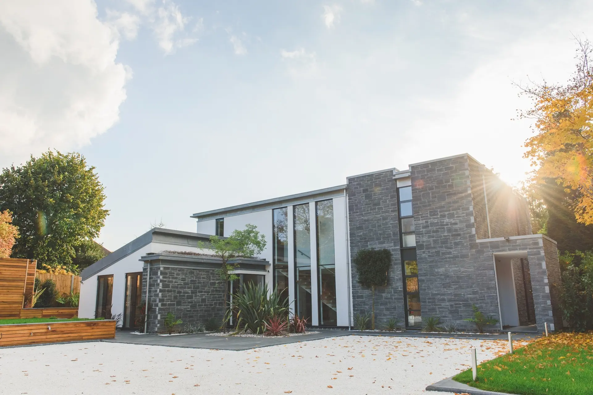 St Elmo's stone and rendered entrance elevation in Epsom