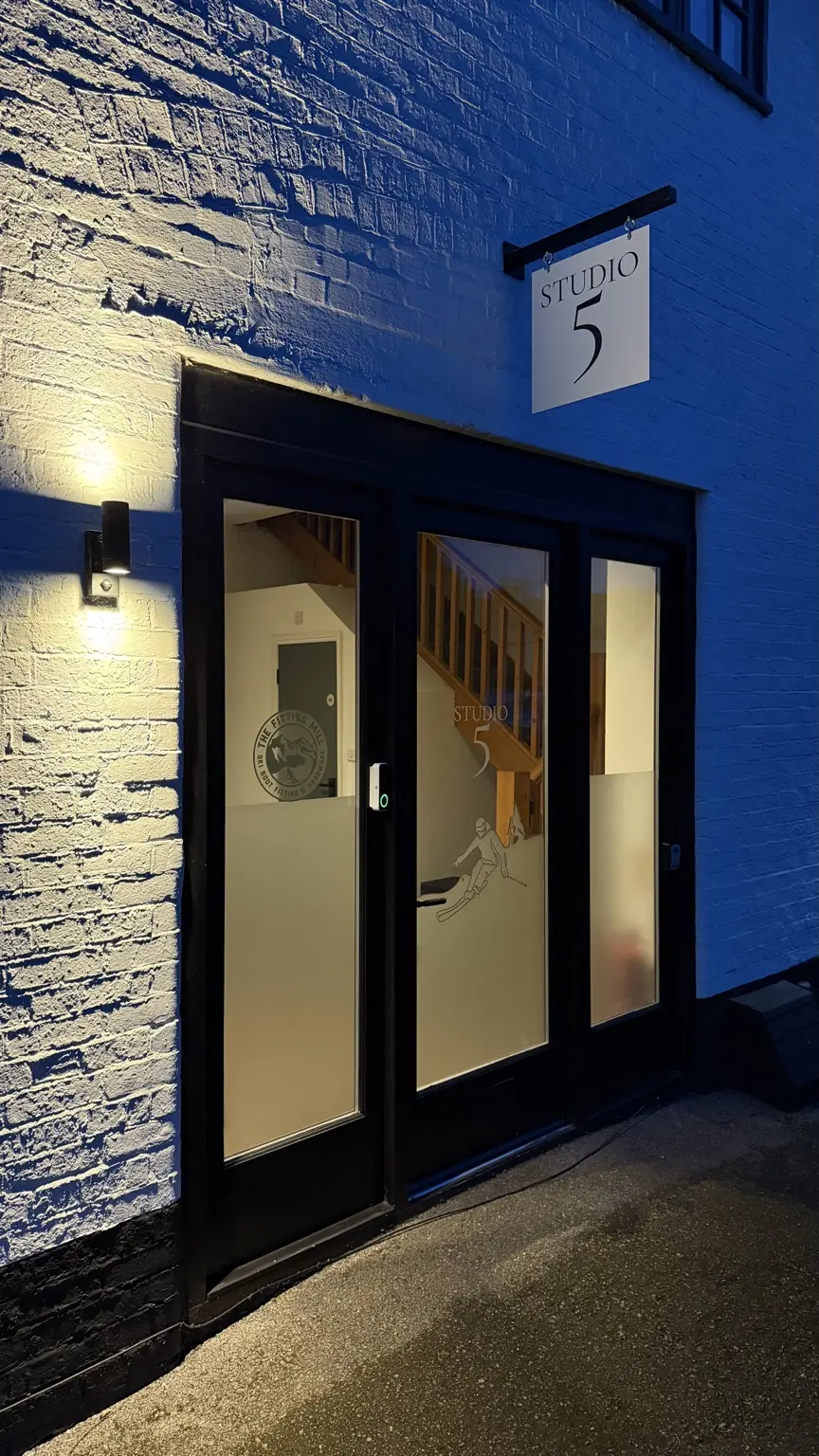 Illuminated entrance to Studio 5 at Bakersgate Courtyard